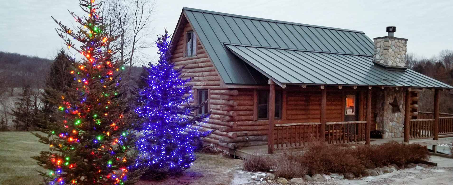 Cabin at Rustic Ridge Resort with Holiday Lights Up