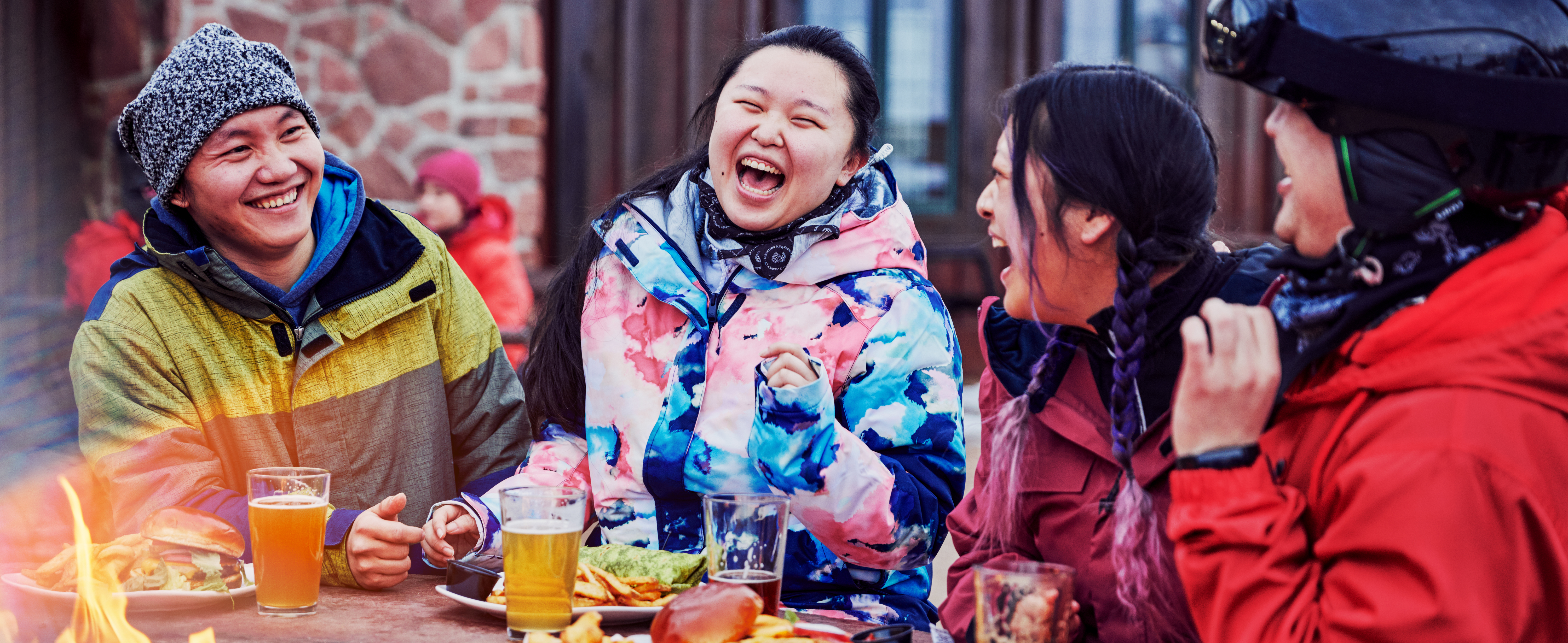 Plan Your Vacation - 071 Friends Enjoying Meal at Ski Hill