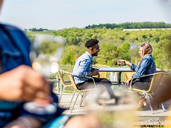Couple enjoying a glasses of wine at Hawks Mill in Green County