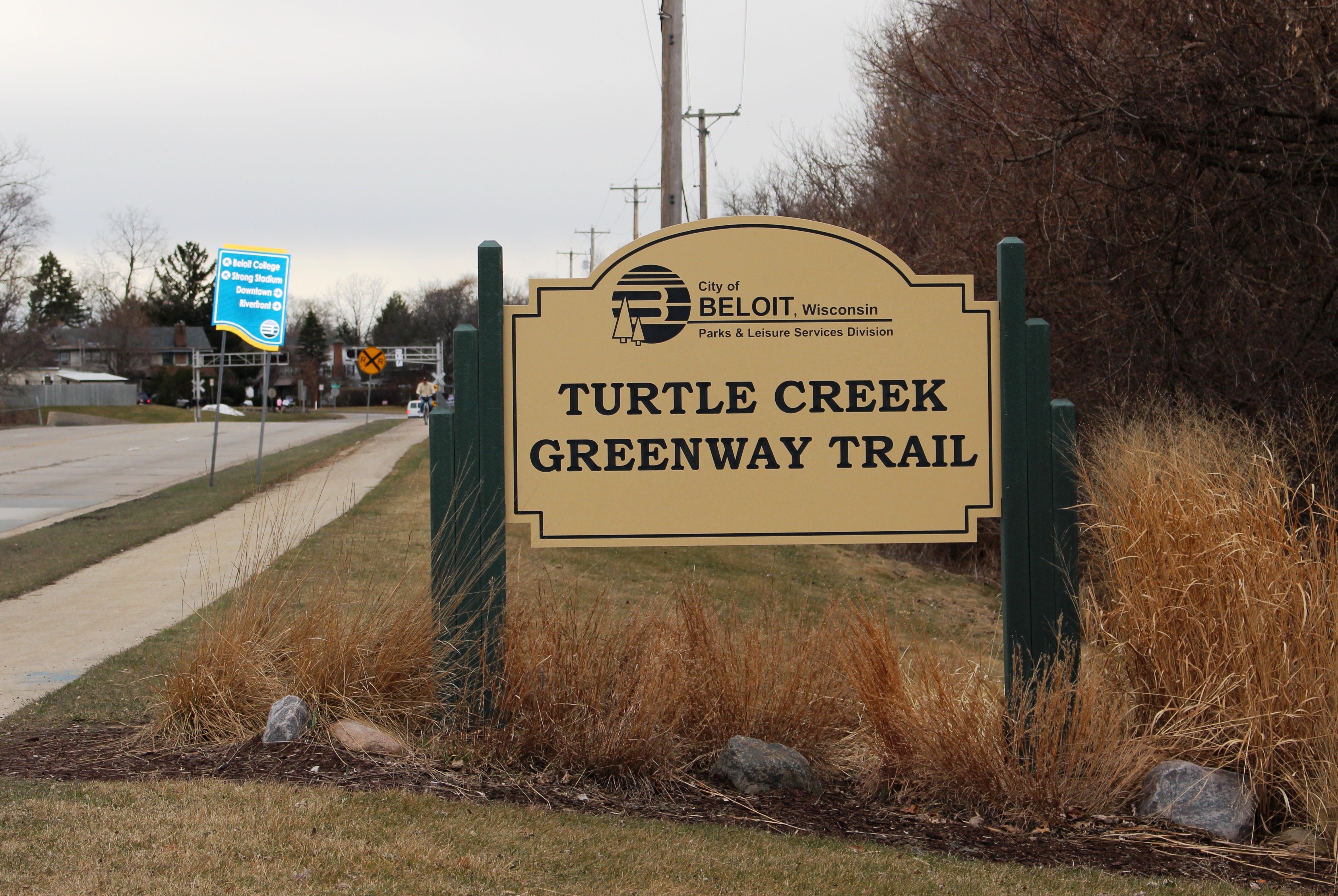 The Turtle Creek trail sign by the parking lot entrance on Milwaukee Road