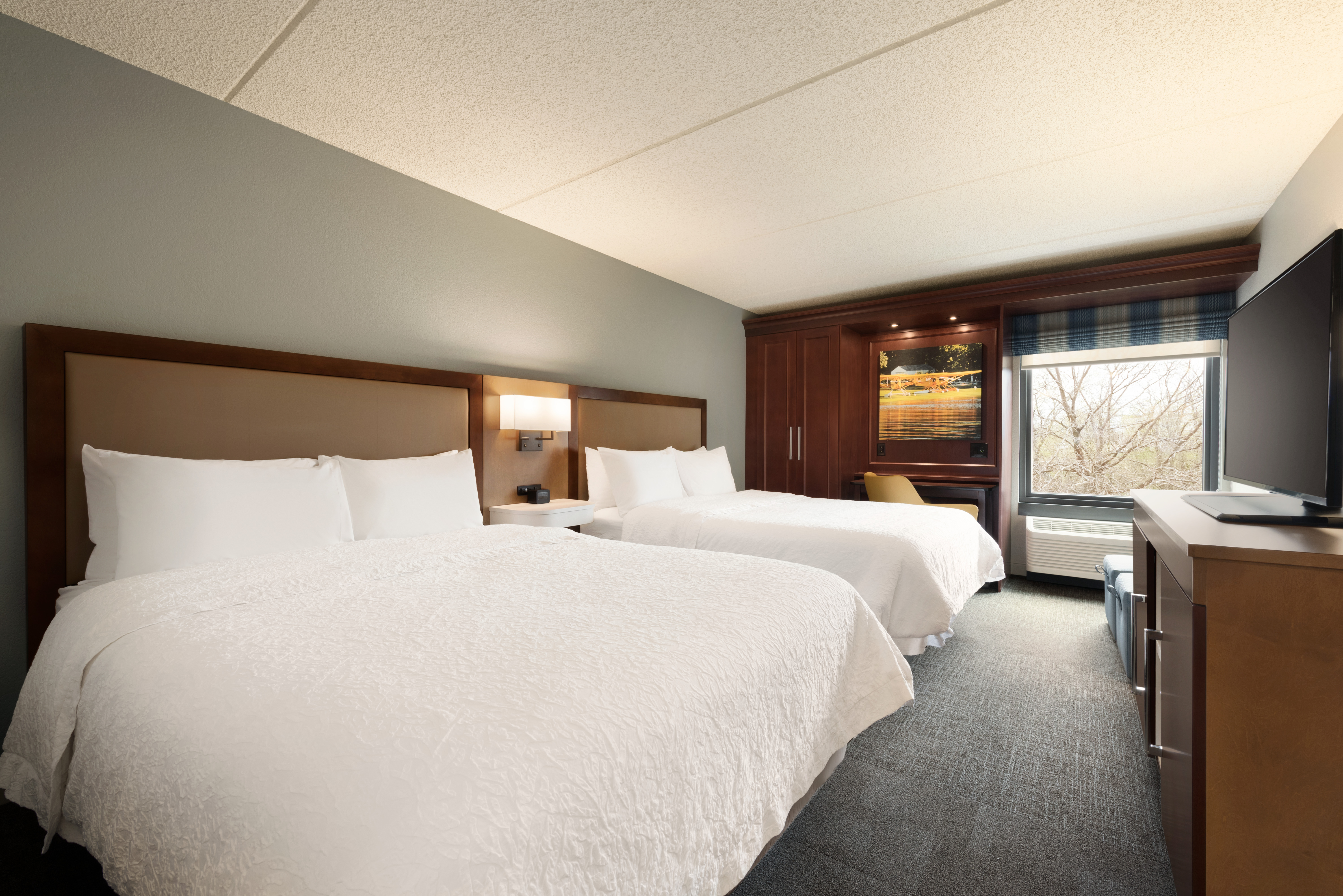 Relax in our Double Queen room with two clean and fresh Hampton beds®.