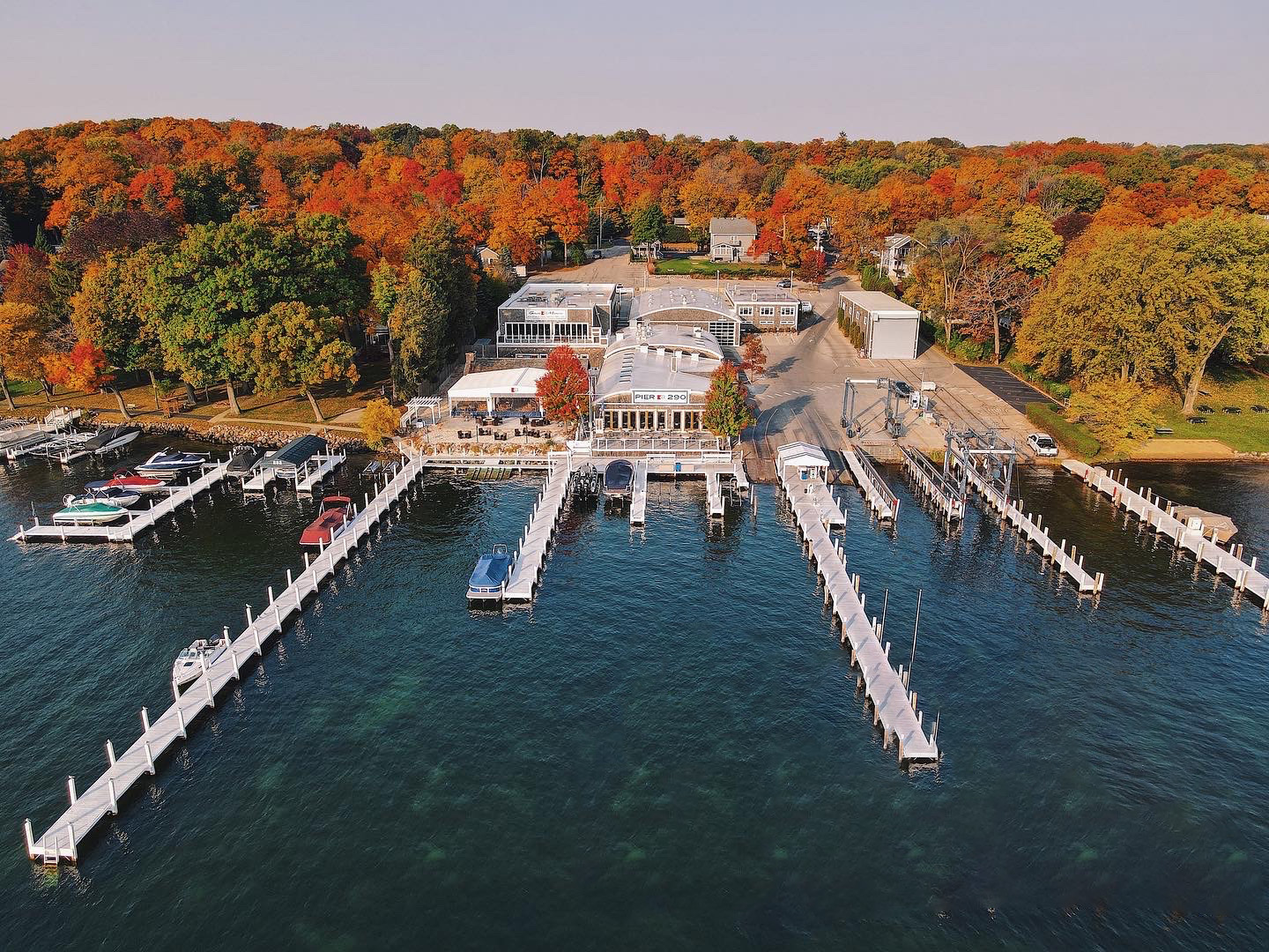 ariel view during fall of the lake and exterior view of Pier 290 restaurant