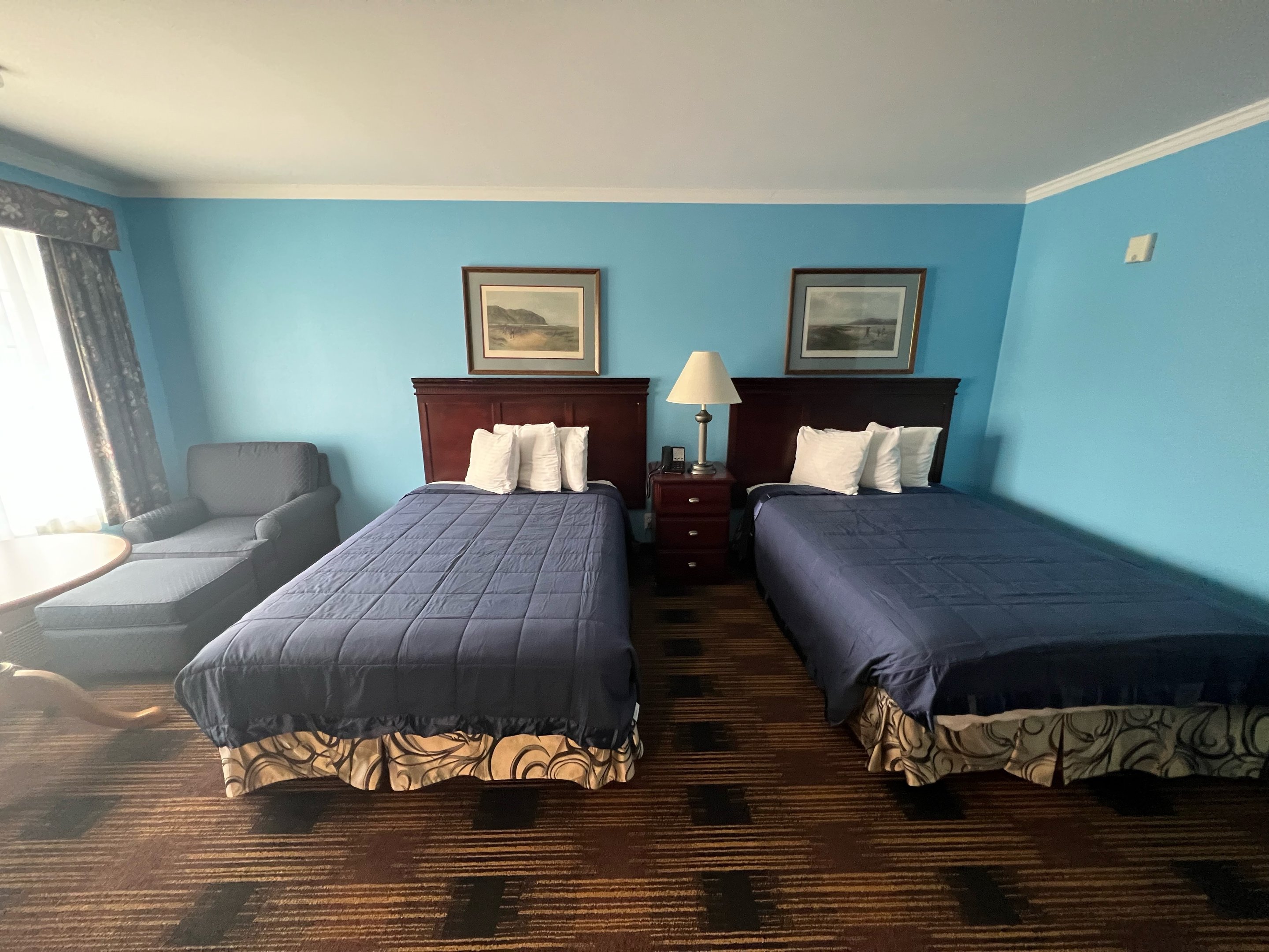 Room with two beds at the Fontana Village Inn.