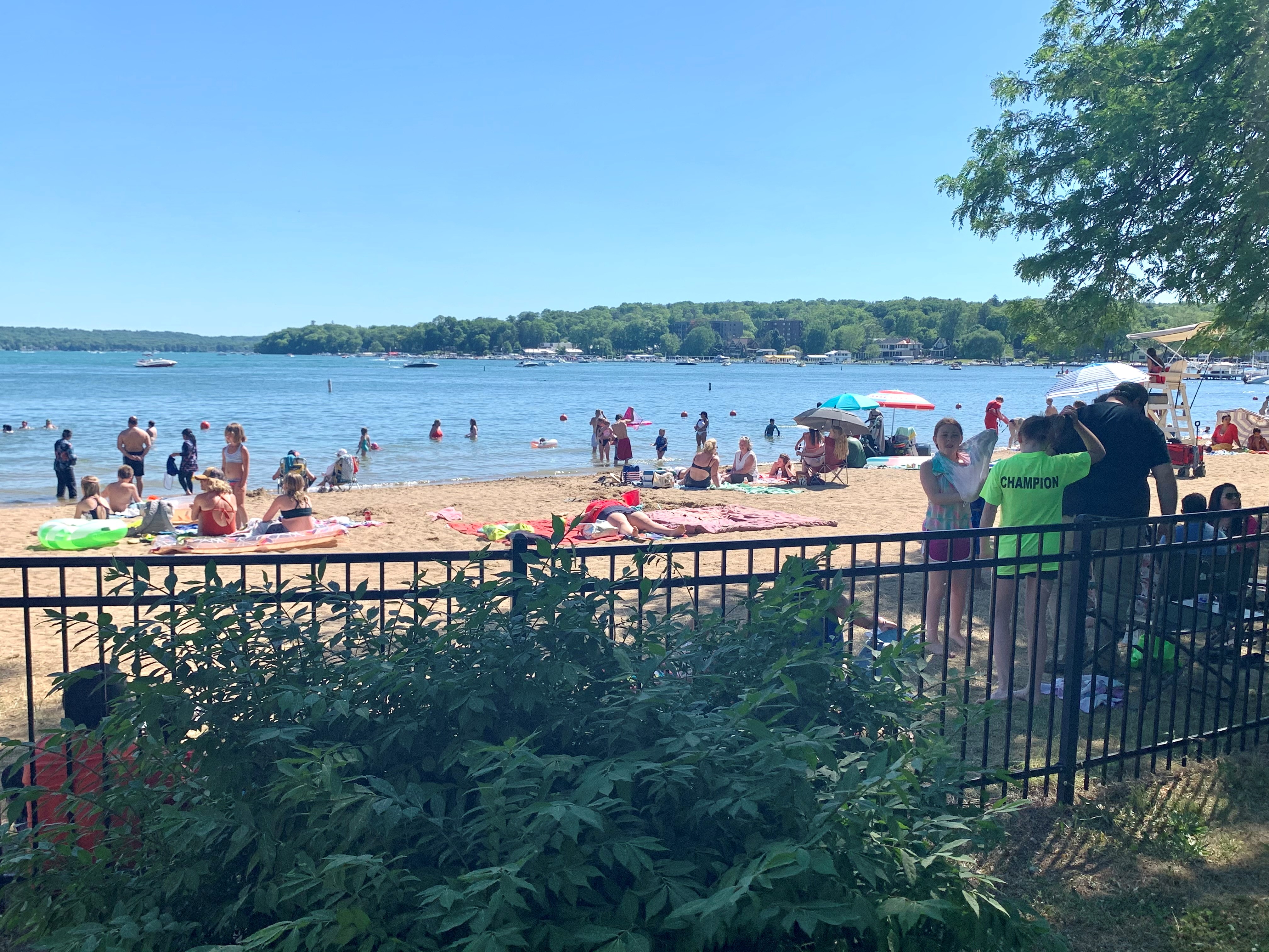 Summer beach goers in Williams Bay