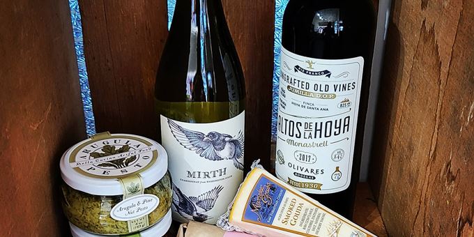 Savor our wines and locally produced specialty foods.