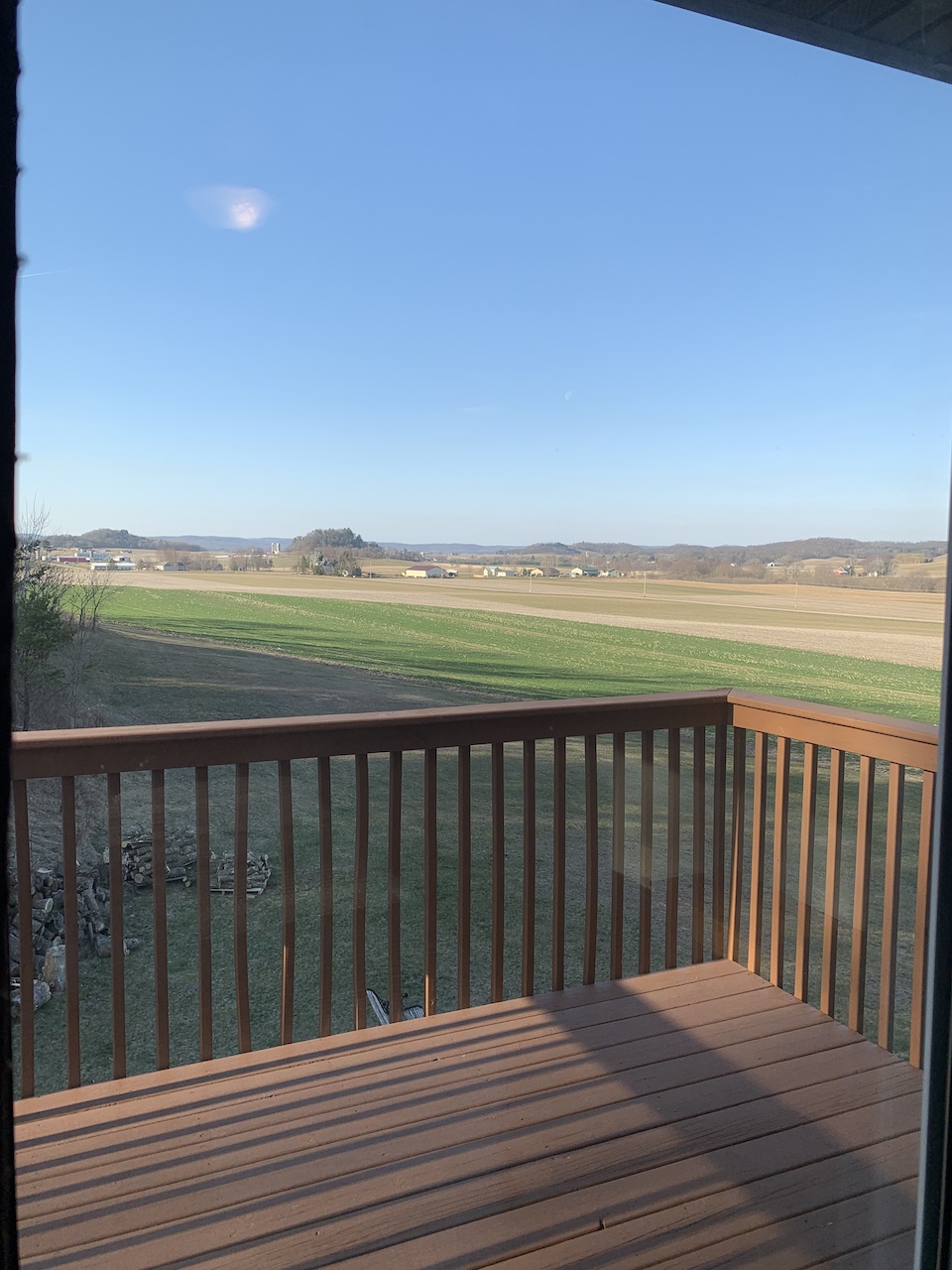 Late morning moon over the horizon from the king room balcony.
