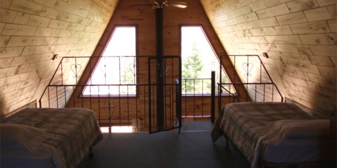 The interior of one of Cedar Cove&#39;s A-frames.