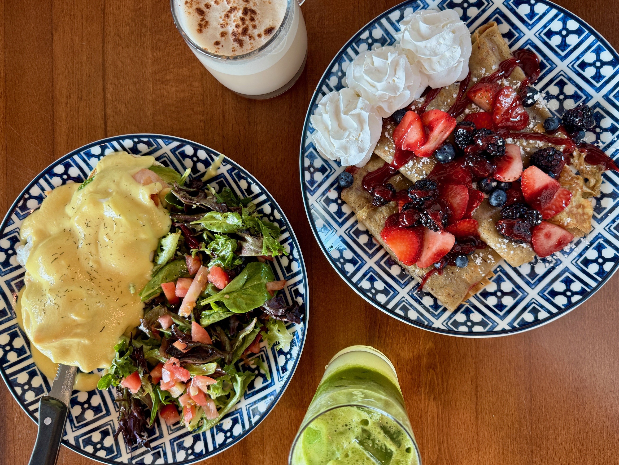 Eggs benedict and triple berry crepes
