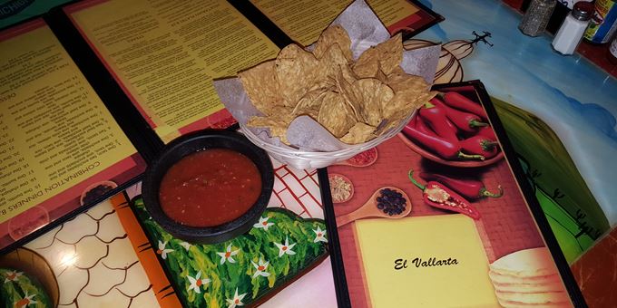 An ample menu, fresh chips and great sauce, and colorful tables all contribute to a fun meal at El Vallarta in Evansville.