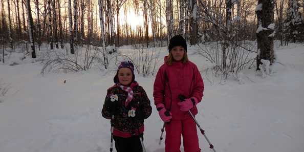 Kids Snowshoeing Until Sunset at Jack Lake Snowshoe Trails.