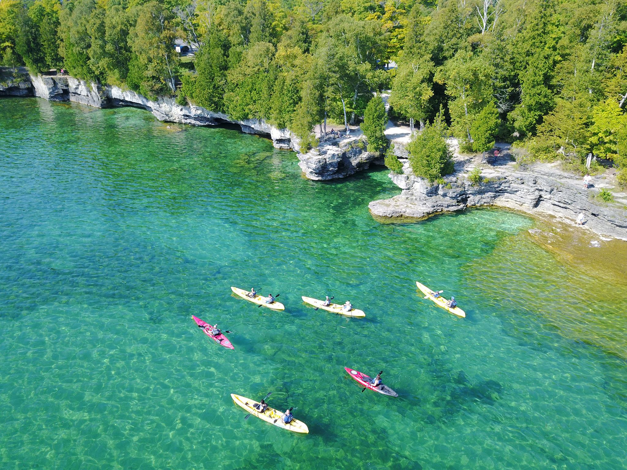 Drone photo of a kayak tour at Cave Point County Park