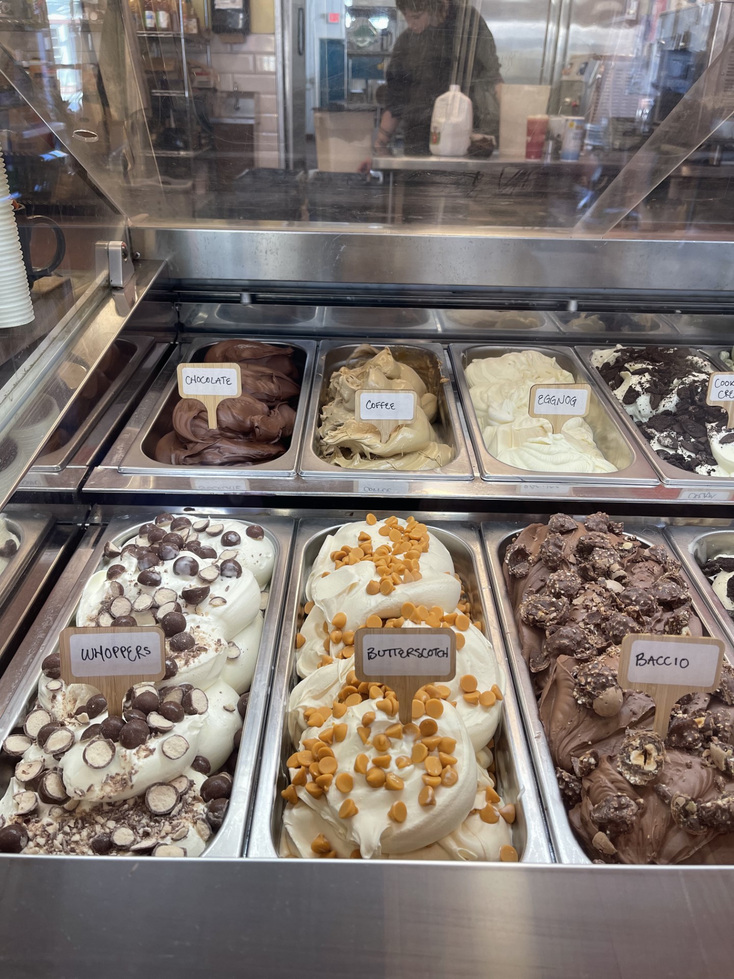 Cooler case full of handmade fresh gelato in a variety of flavors.