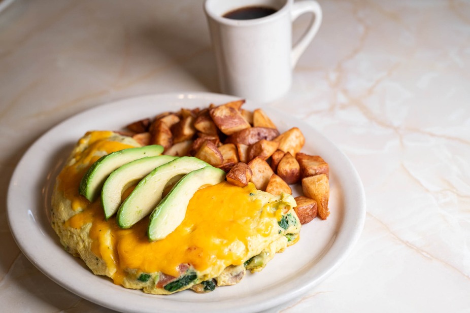 Omelet with avocado on top