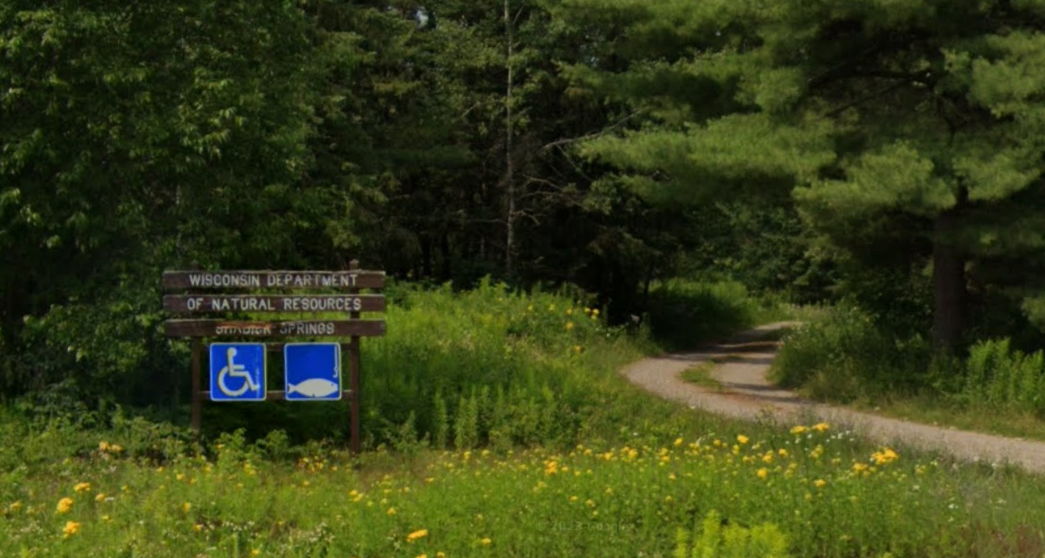 Sign marking the road to Shadick Spring Pond off of Country Road A.