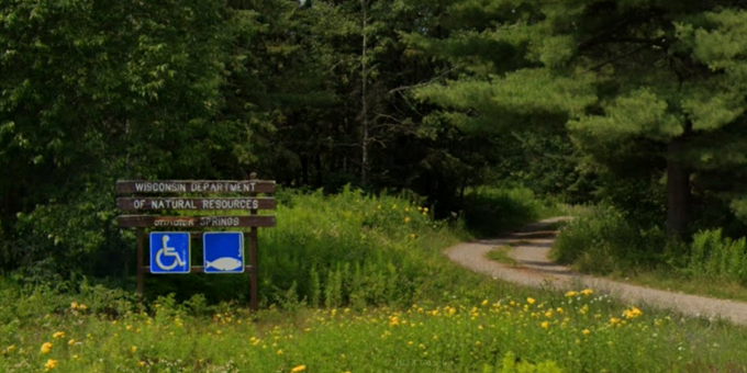 Sign marking the road to Shadick Spring Pond off of Country Road A.