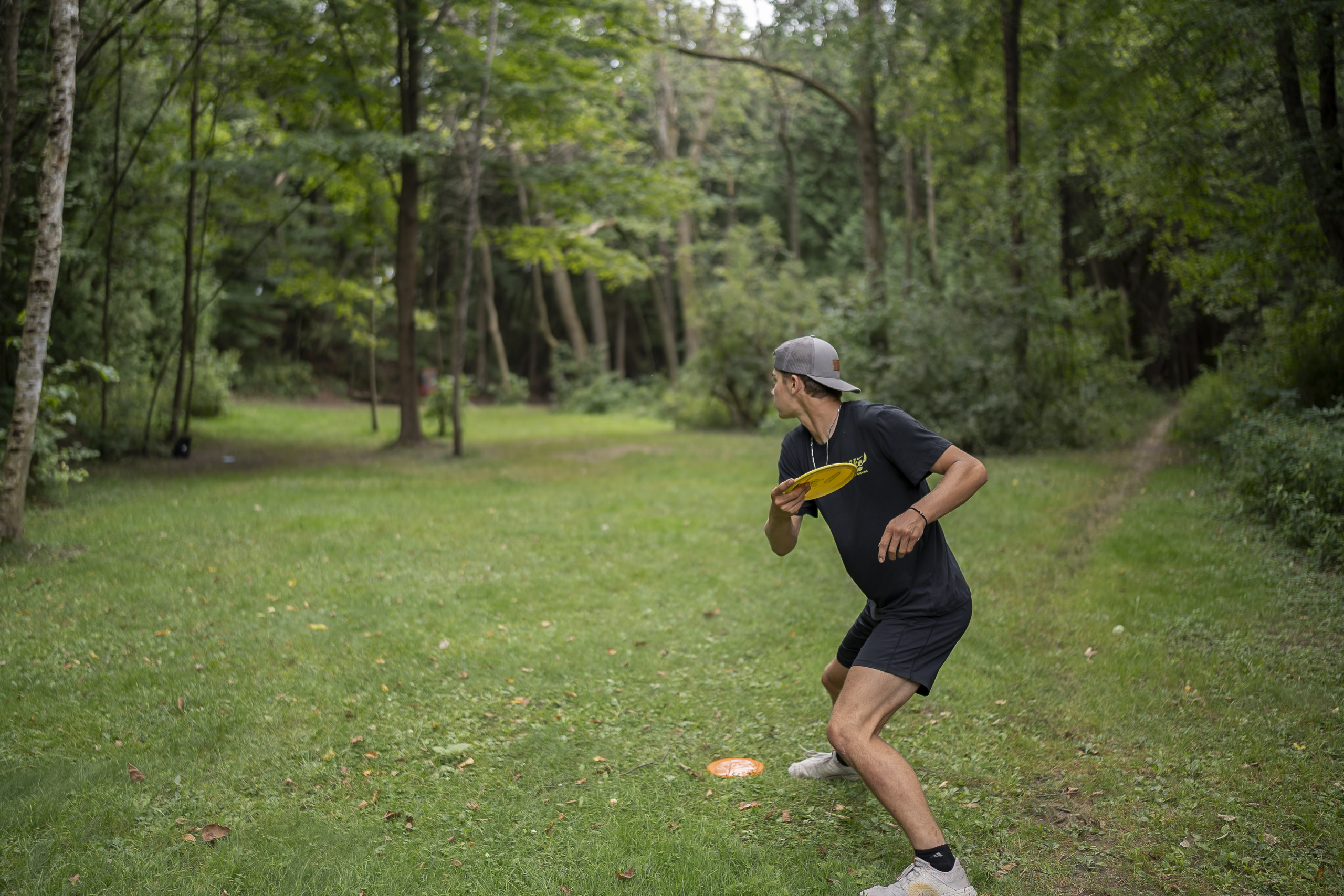 boy throwing frisbee at Silver Creek Park