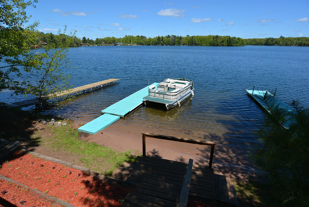 Hang out at our beach area overlooking Little Round Lake