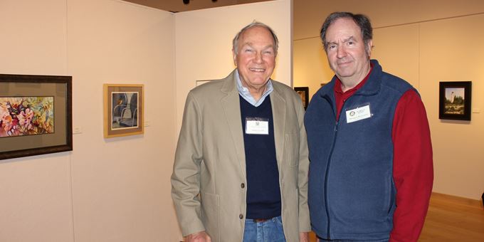 Enjoying a new arts exhibition in Gallery 110 North of the Plymouth Arts Center.  PAC President Tom Slater and Mayor Don Pohlman