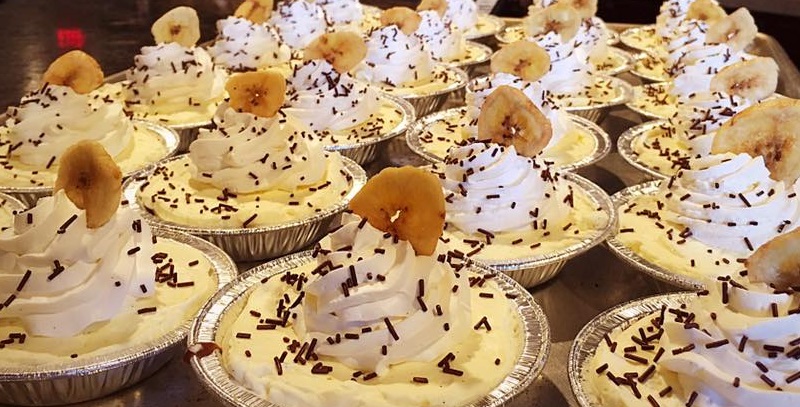 Peanut Butter Crust Fudge Bottom Banana Cream Pie with Rum Whipped Cream