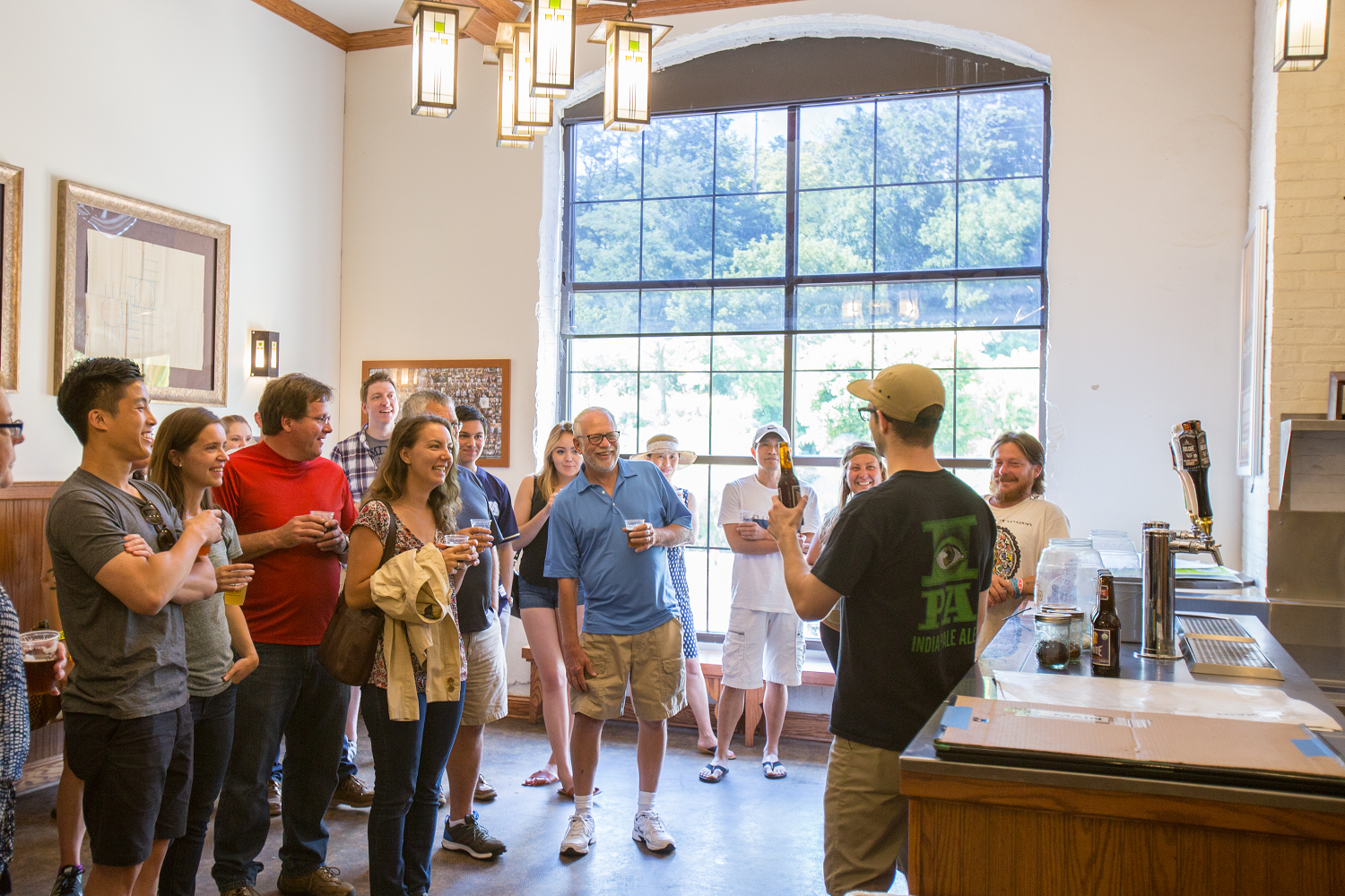 People Smiling During Lakefront Brewery Tour