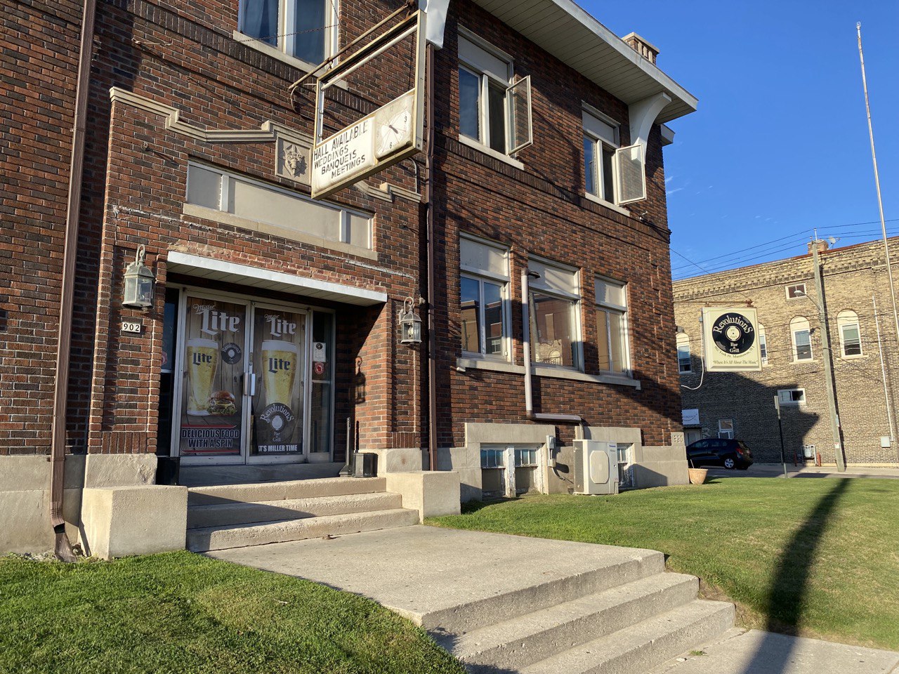 Outside view of Revolutions Bar &amp; Grill in Manitowoc