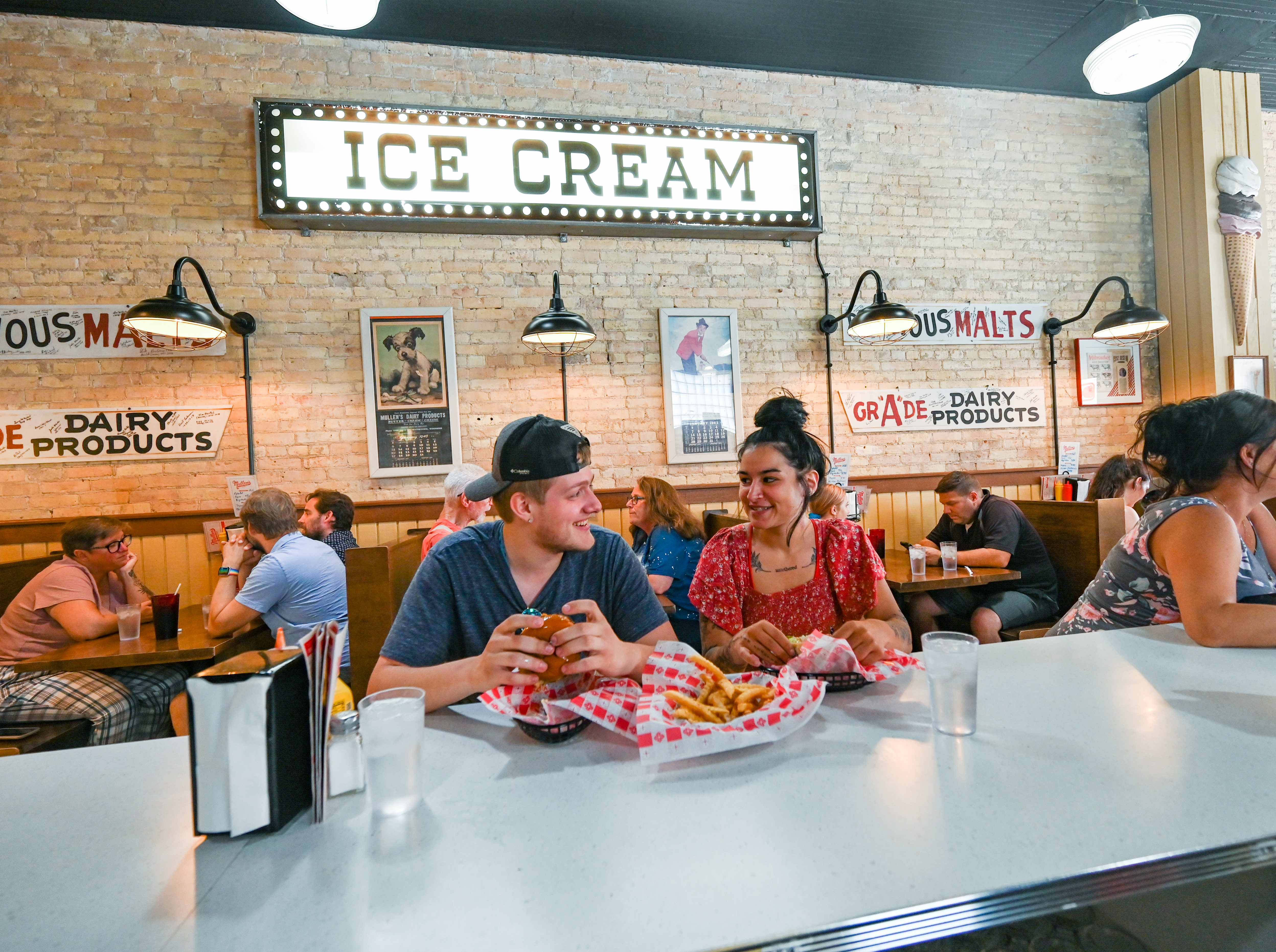 People eating lunch and homemade ice cream at Mullen's Dairy bar in Watertown Wi