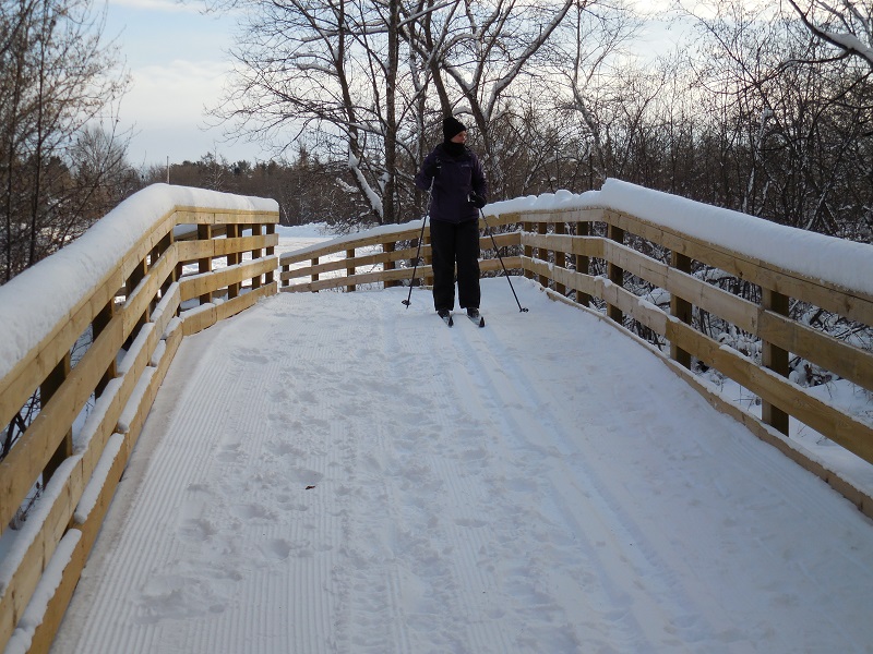 Cross Country Skiing down one of the Springbrook Trail bridges in the City of Antigo