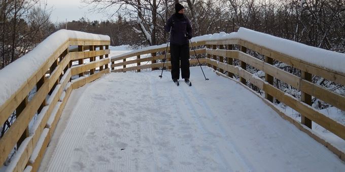 Cross Country Skiing down one of the Springbrook Trail bridges in the City of Antigo