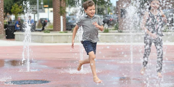 Water feature play at Wenzel Family Plaza.