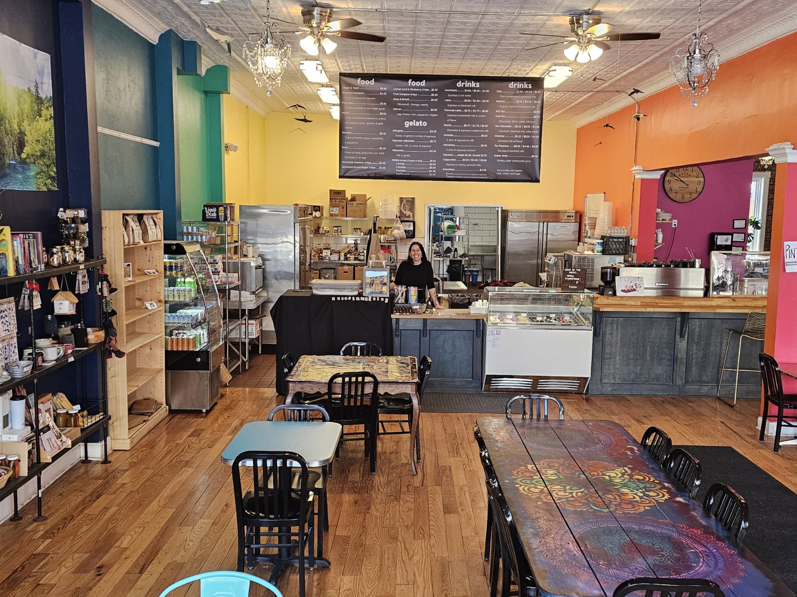 Owner Amy behind the counter at the vibrant downtown cafe Magpie Gelato