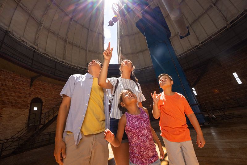 Family Use Sign Language While Exploring Yerkes Observatory