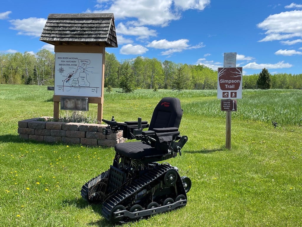 Tracked wheelchair at the Iron River National Fish Hatchery trails.