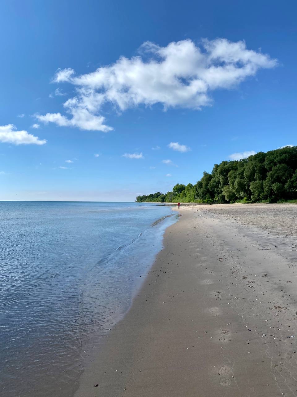 Red Arrow Beach with blue skies in Manitowoc