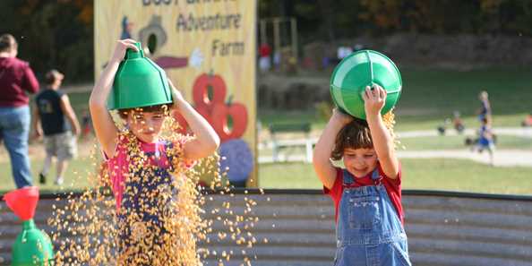 Fun in the corn during Busy Barns Adventure Farms Fall Festival.