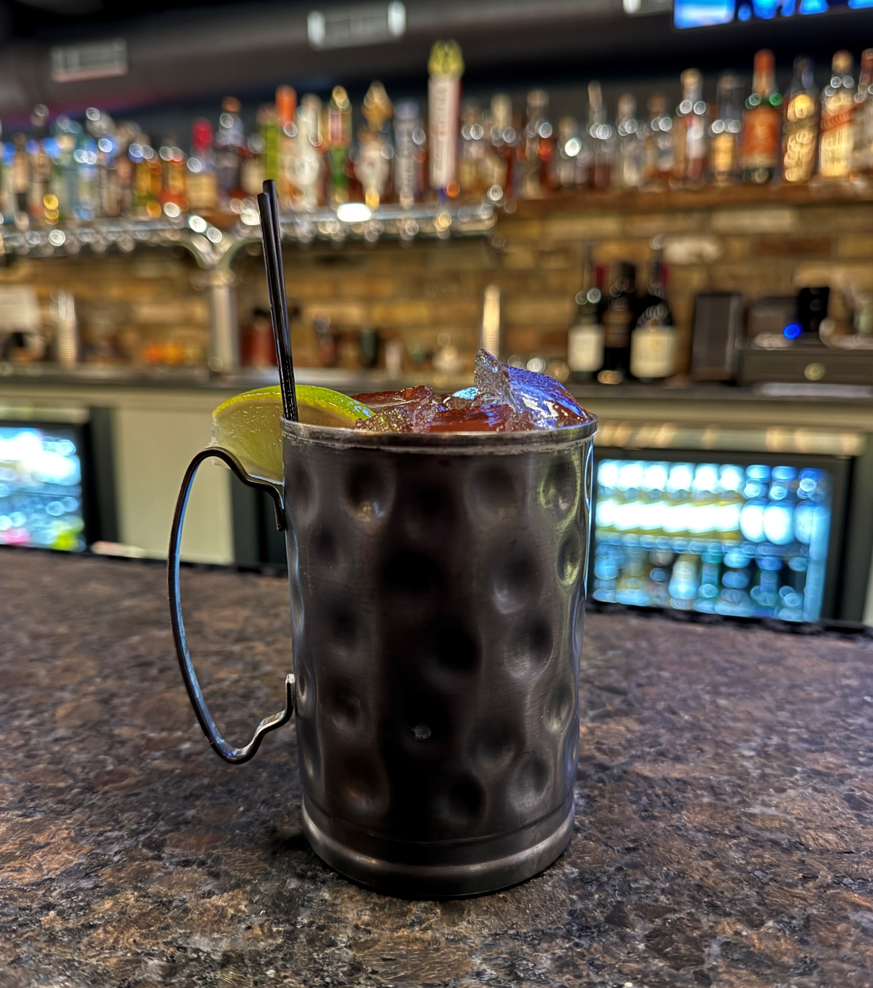 Mocktail mule on bar at Brick's Manitowoc