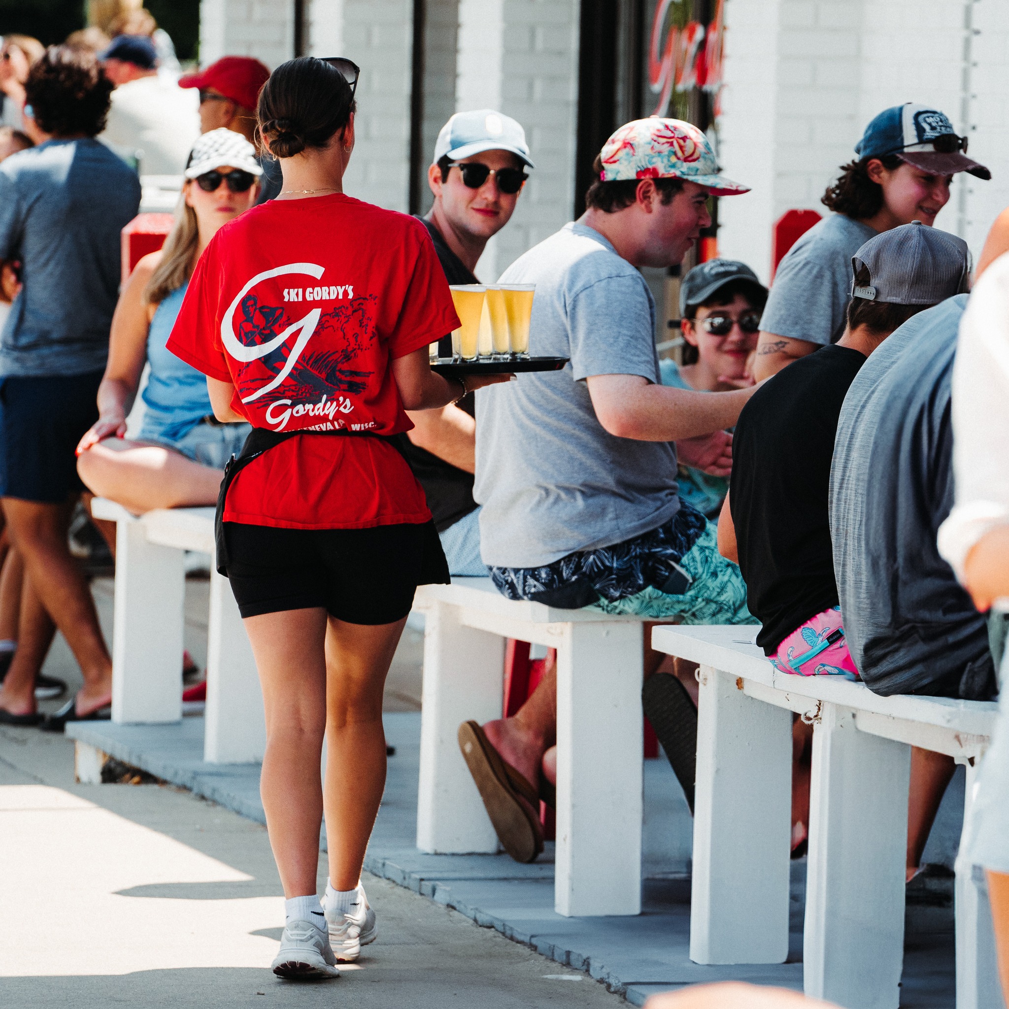 Server delivering drinks at Gordy's