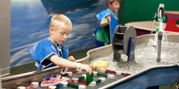 Children of all ages love to play in the Waterways Room.