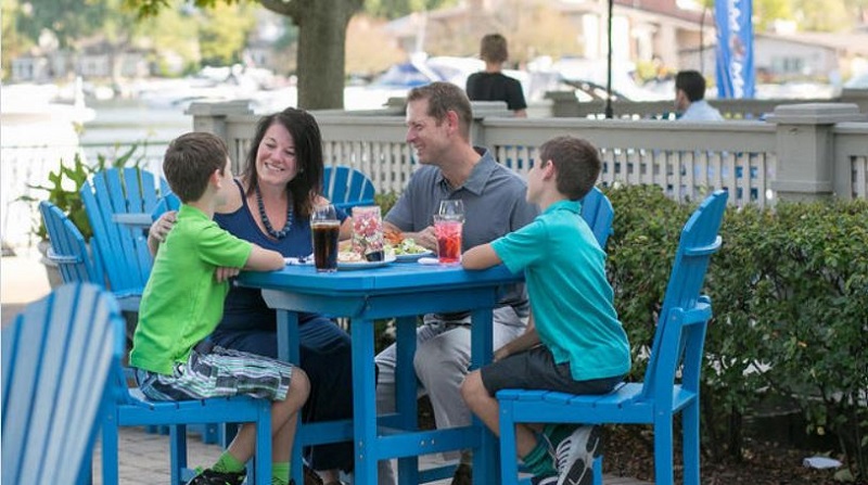 Family dining outside.