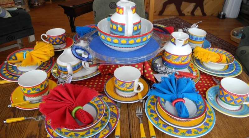 Table full of dishes.