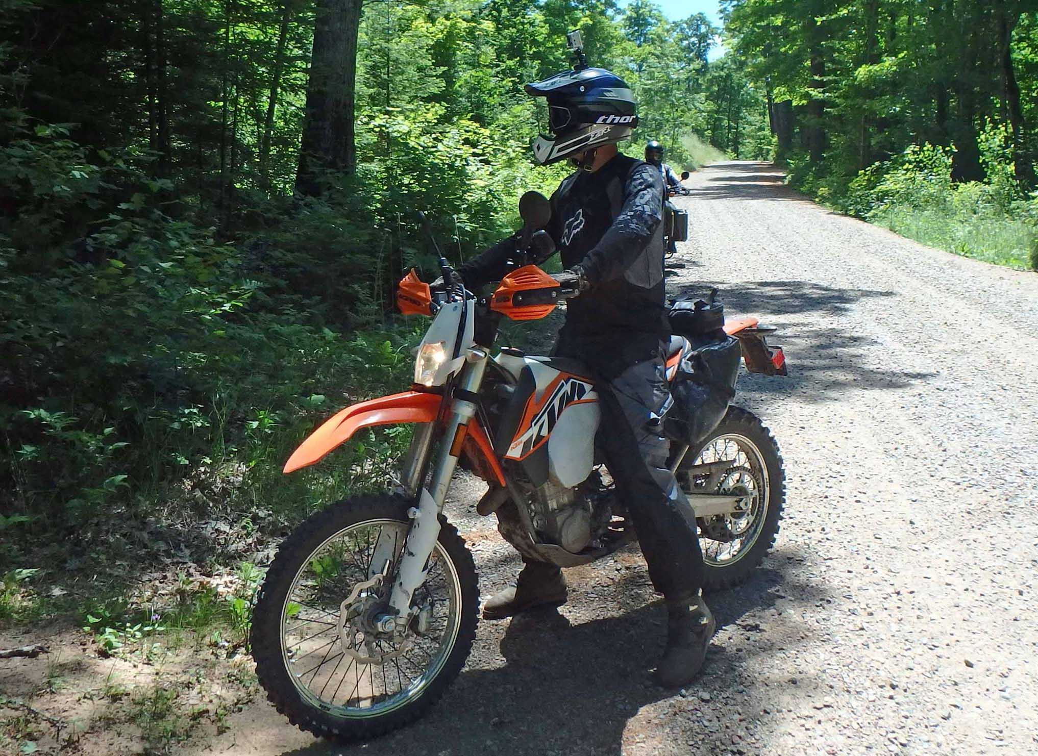 A dual sport rider enjoying the backroads and forest paths in the Boulder Junction area.