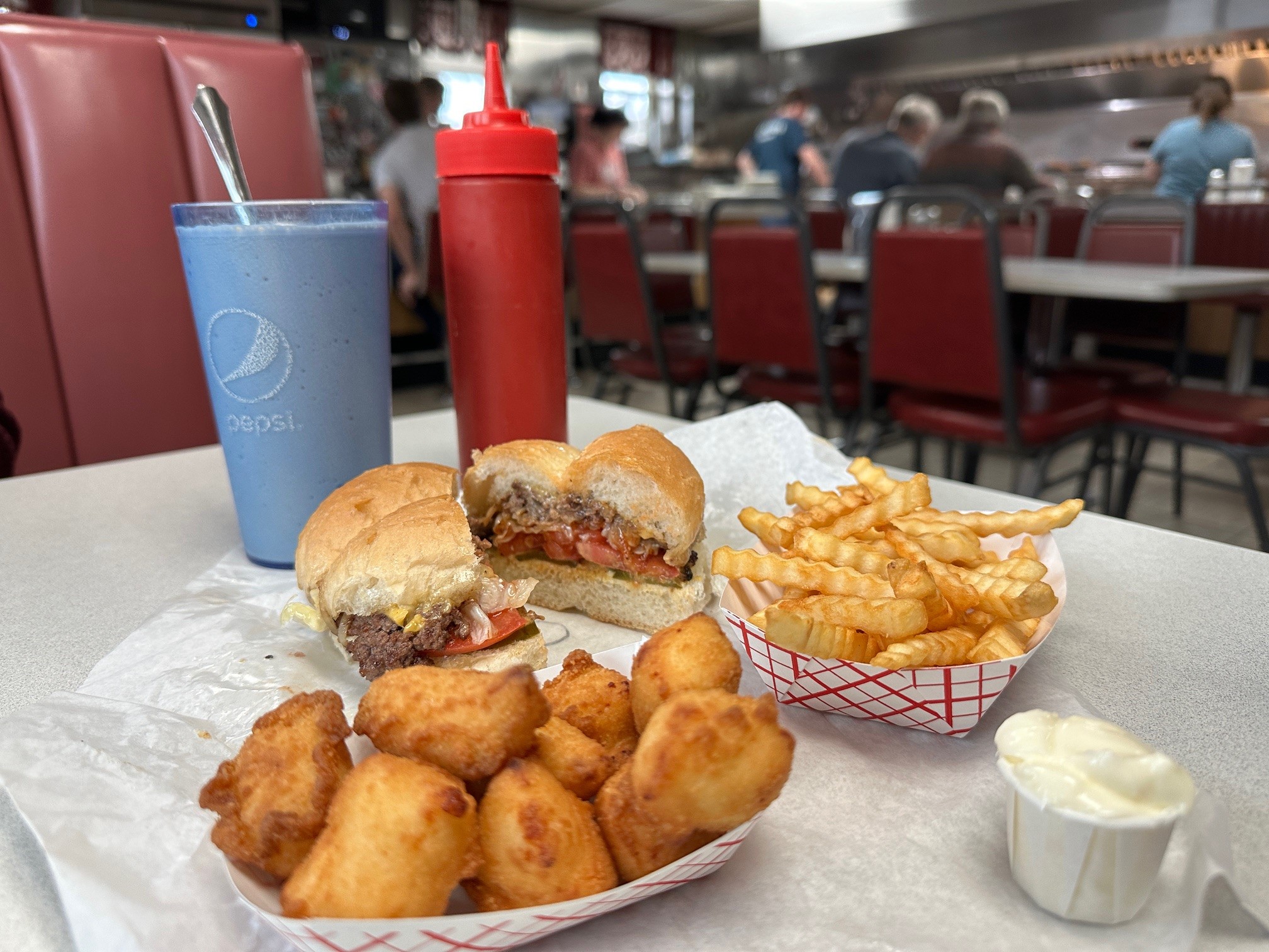 cheese curds burger and fries at Bud Willmans
