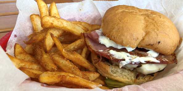 The delicious Hilly Haven Burger, 1/4lb burger with ham, provolone and horseradish.