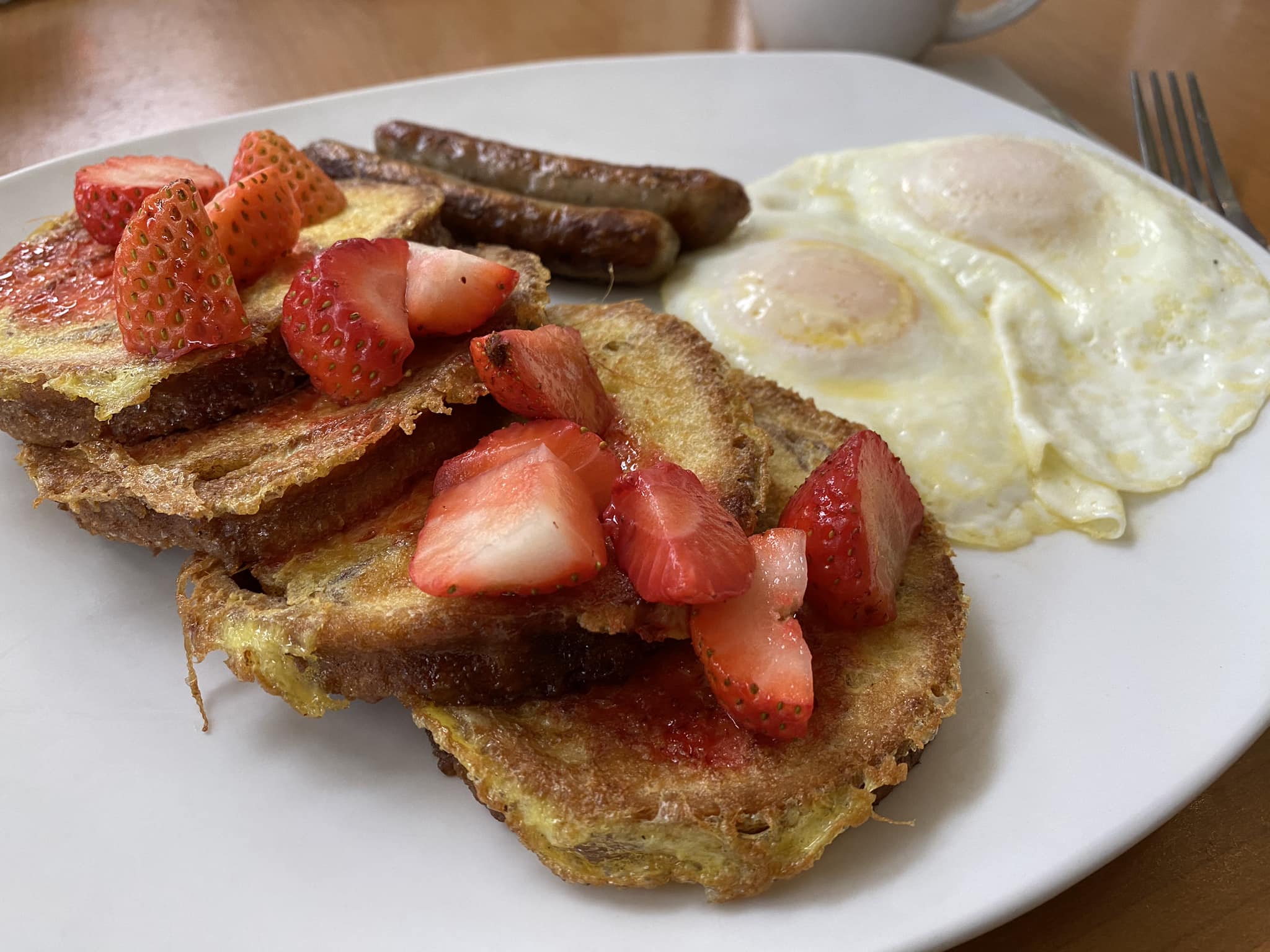 french toast with strawberries and eggs