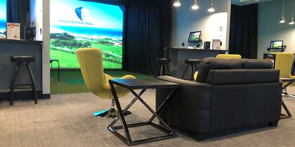 6 High Definition Golf Simulators in modern setting with complete food and beverage service