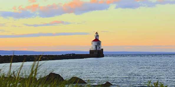 Superior Entry Lighthouse on Wisconsin Point at sunset. Photo by Megan Wilson.