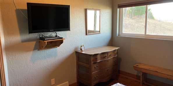 Both bedrooms include a flat screen TV and DVD player with plenty of DVD options to rent.