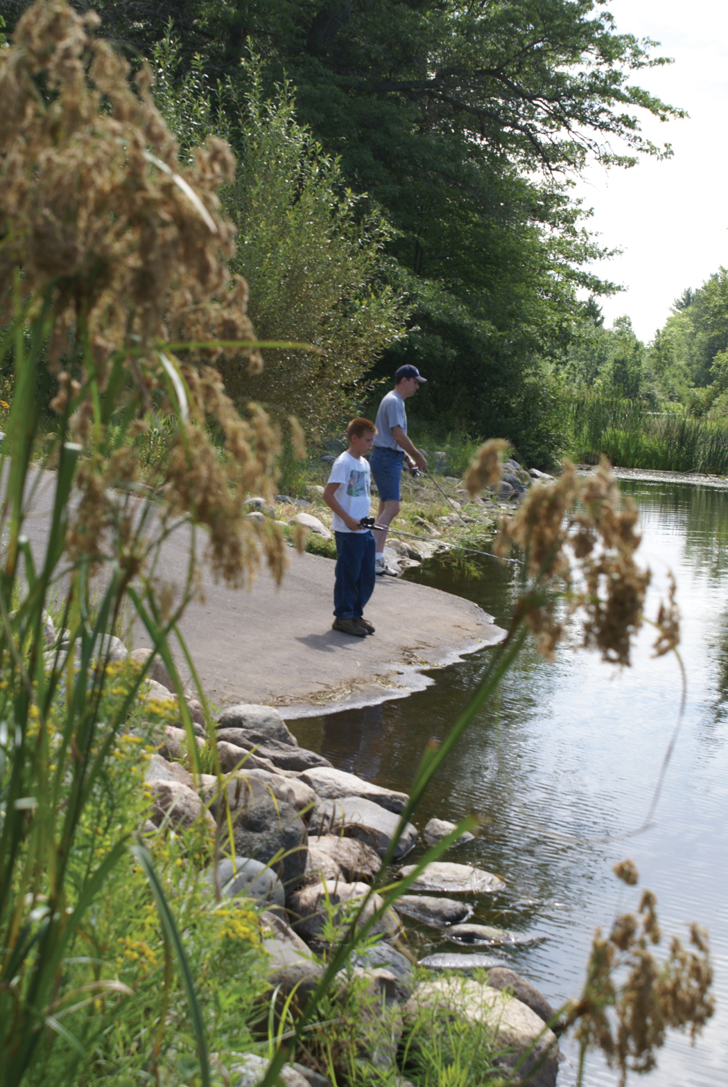 Teaching the youth shoreline fishing at Post Lake Dam Recreation Area.