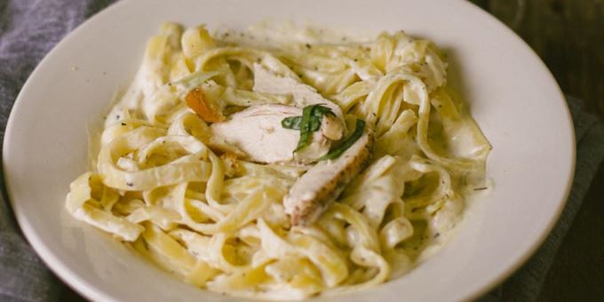 Delicious, made from scratch, Chicken Fettuccini Alfredo. Truly a Christianos favorite!