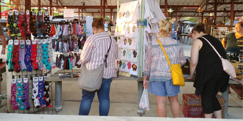 Selling at an event at the Farmer's Market across the street