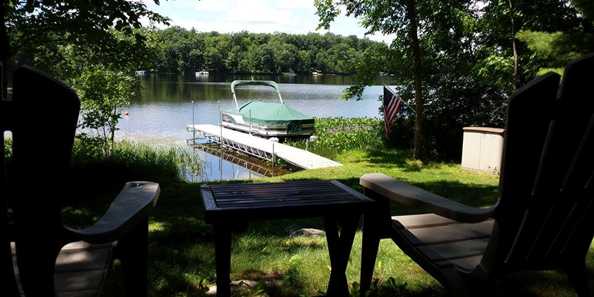 Sit and relax on Long Lake at Reverie Cabins.